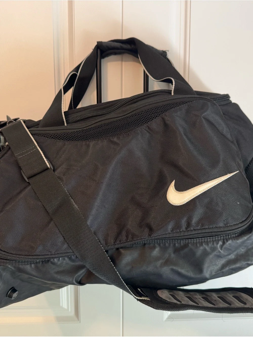 Nike Black Duffel Bag with White Swoosh Accent
